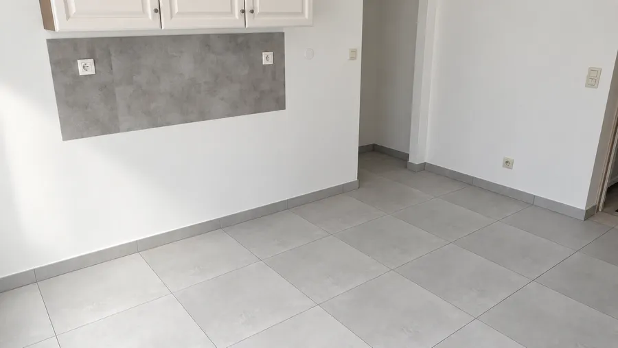 Aplication de carrelage au sol